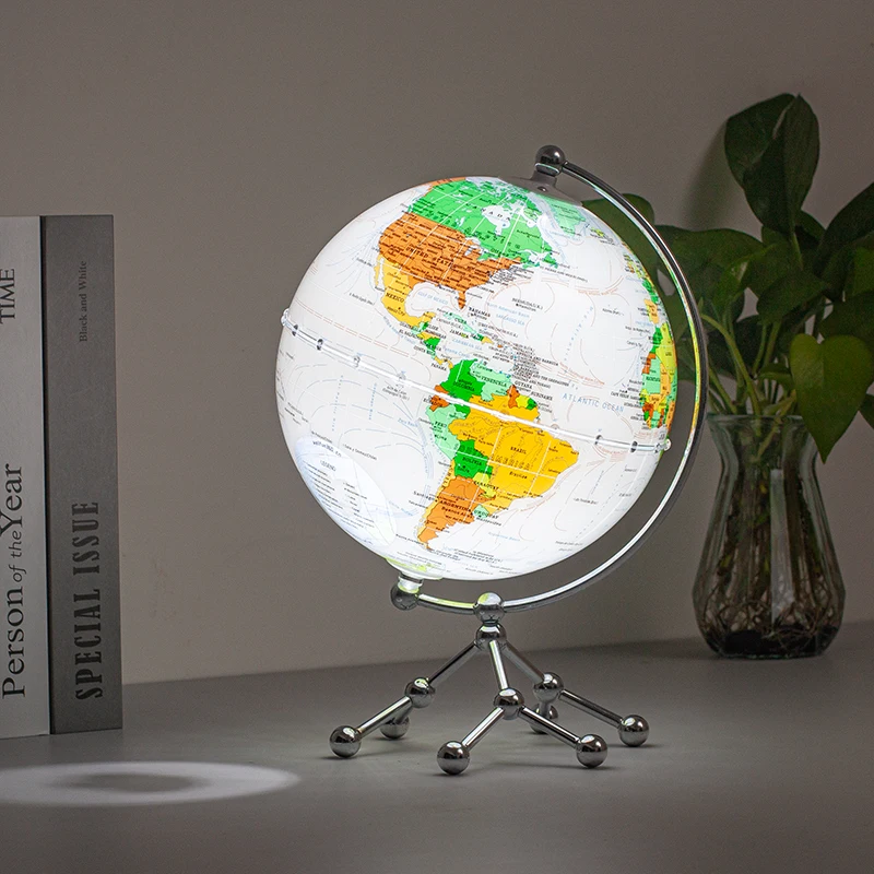 H8acc9df67c1e48e8abfb690fab5010e7l.webp Fashion Iron Plastic World Rotating Globe With Metal Stand Light Decoration for Hom Desk Decor Globe - Image 1